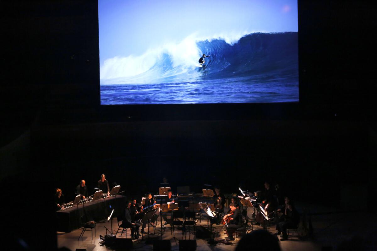 Richard Tognetti, artistic director of the Australian Chamber Orchestra, led the ensemble in a performance of "The Reef," which blended music with a surf film.