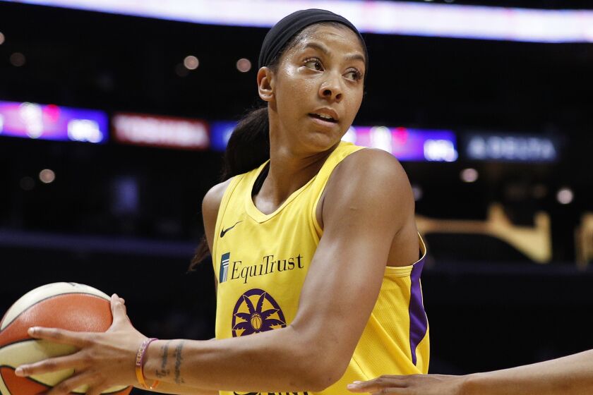LOS ANGELES, CALIFORNIA - AUGUST 08: Forward Candace Parker #3 of the Los Angeles Sparks looks to pass defended by forward Brianna Turner #21 of the Phoenix Mercury at Staples Center on August 08, 2019 in Los Angeles, California. NOTE TO USER: User expressly acknowledges and agrees that, by downloading and or using this photograph, User is consenting to the terms and conditions of the Getty Images License Agreement. (Photo by Meg Oliphant/Getty Images)