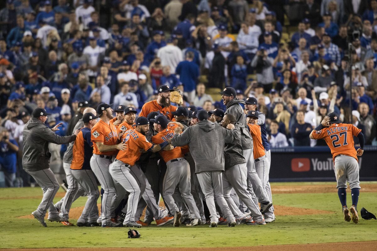 The Houston Astros celebrate after winning Game 7 of the 2017 World Series at Dodger Stadium