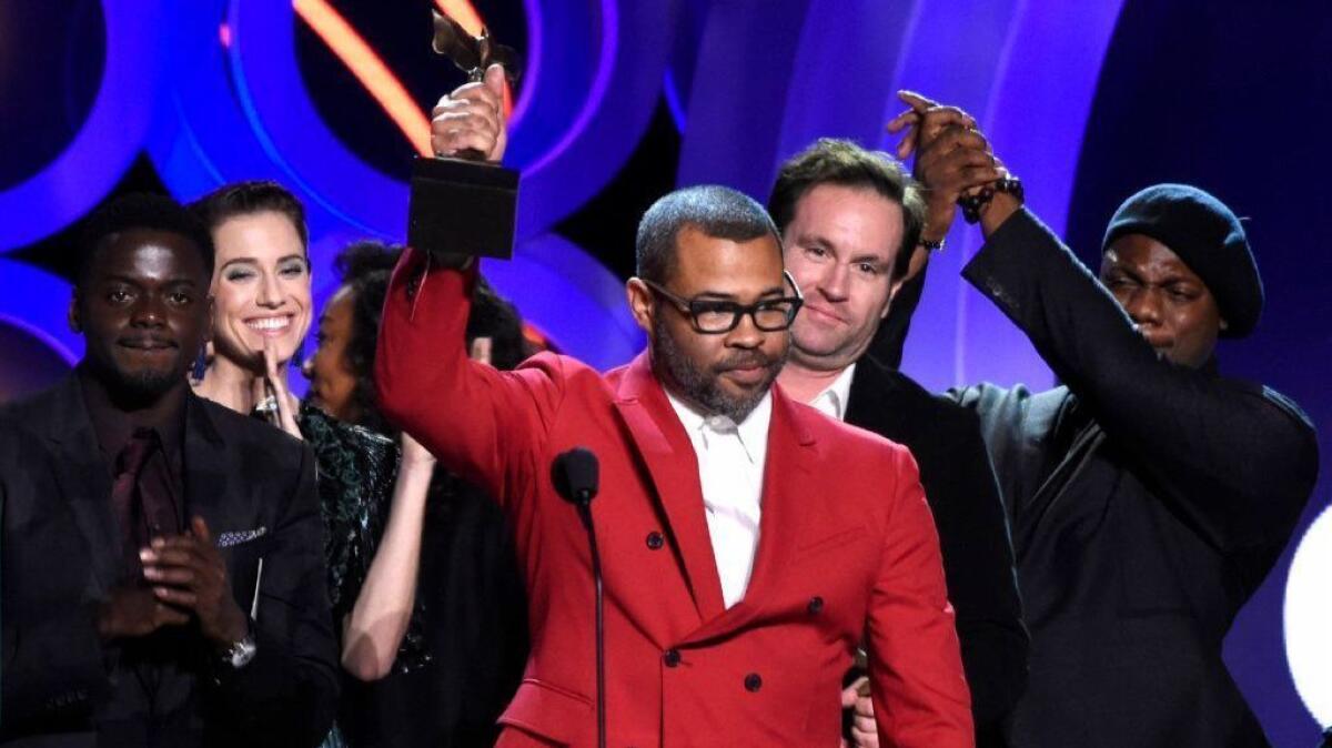 "Get Out" writer-director Jordan Peele accepts the award for best feature Saturday at the 33rd Film Independent Spirit Awards in Santa Monica.