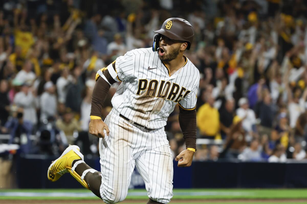 The Padres' Trent Grisham reacts after hitting a solo home run