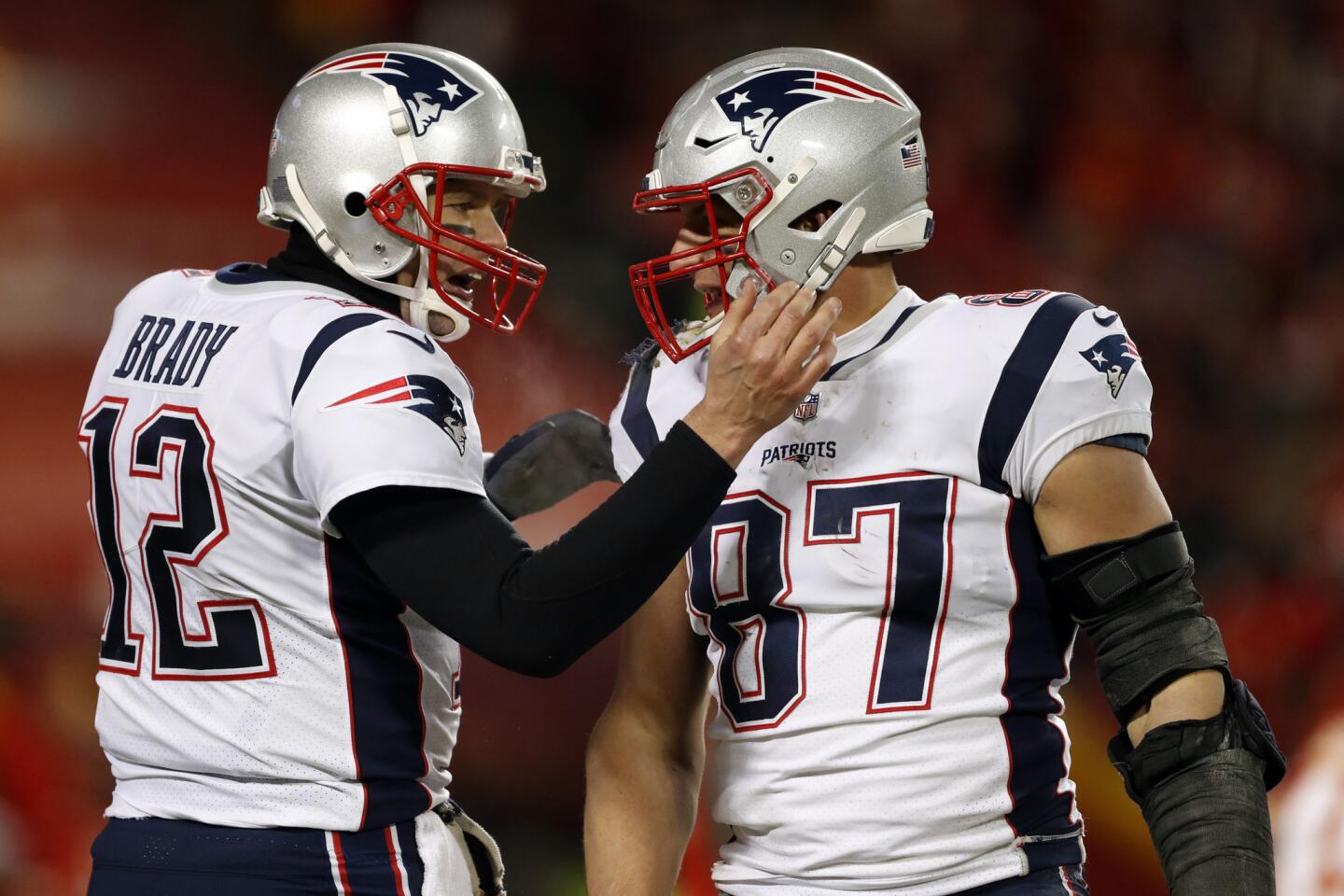 New England Patriots quarterback Tom Brady (12) celebrates with tight end Rob Gronkowski (87) during the second half of the AFC Championship NFL football game against the Kansas City Chiefs, Sunday, Jan. 20, 2019, in Kansas City, Mo.