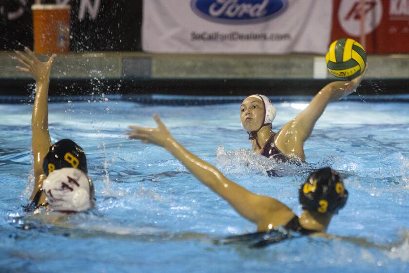 Laguna Beach's Emma Lineback scores against Foothill during the CIF Southern Section Division 1 title match at Irvine’s Woollett Aquatics Center on Saturday, February 22, 2020. ///ADDITIONAL INFO: tn-dpt-sp-lb-laguna-foothill-20200222 2/22/20 - Photo by DREW A. KELLEY, CONTRIBUTING PHOTOGRAPHER