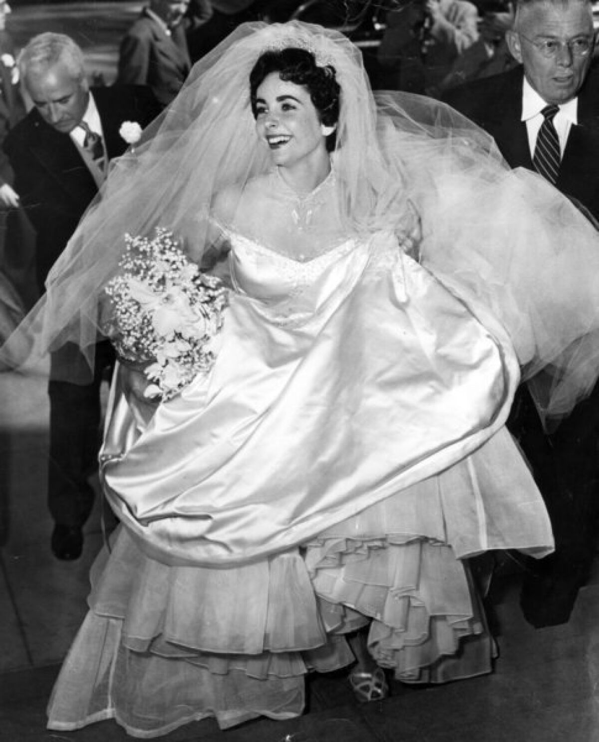 Elizabeth Taylor enters the Church of the Good Shepherd in Beverly Hills for her first wedding, to Conrad "Nick" Hilton Jr.