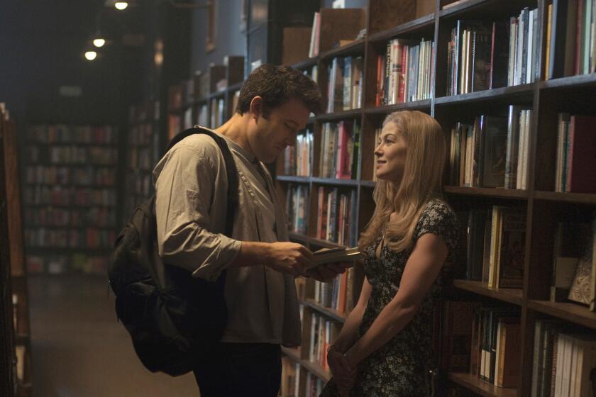 Ben Affleck as Nick and Rosamund Pike as Amy in "Gone Girl."