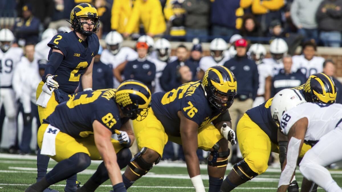 Michigan quarterback Shea Patterson led a crushing victory against Penn State on Saturday.