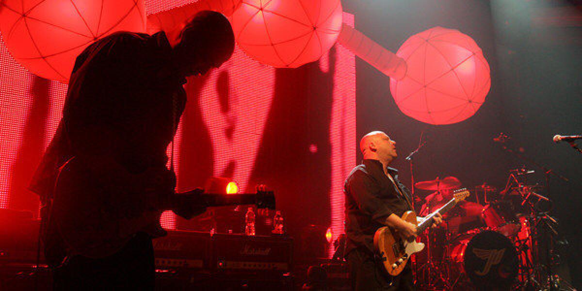 Joey Santiago, left, and Frank Black of the Pixies. The band has announced the departure of bassist Kim Deal.