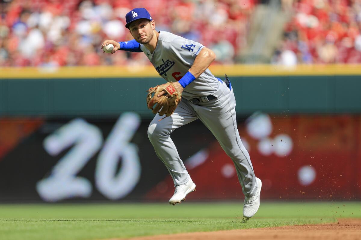 Dodgers second baseman Trea Turner fields a ball during the third inning Saturday.