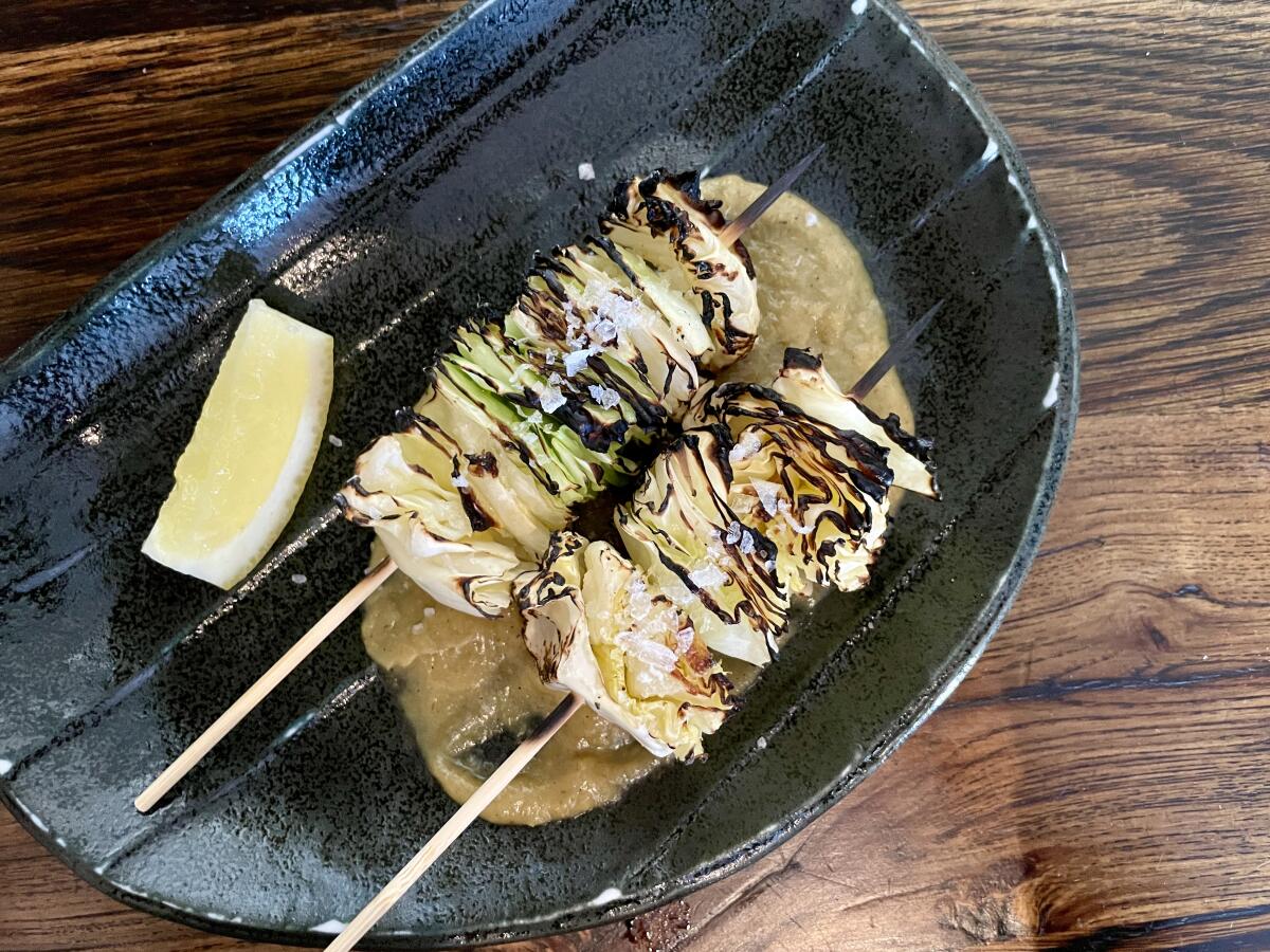 Two skewers of grilled cabbage at Tsubaki.