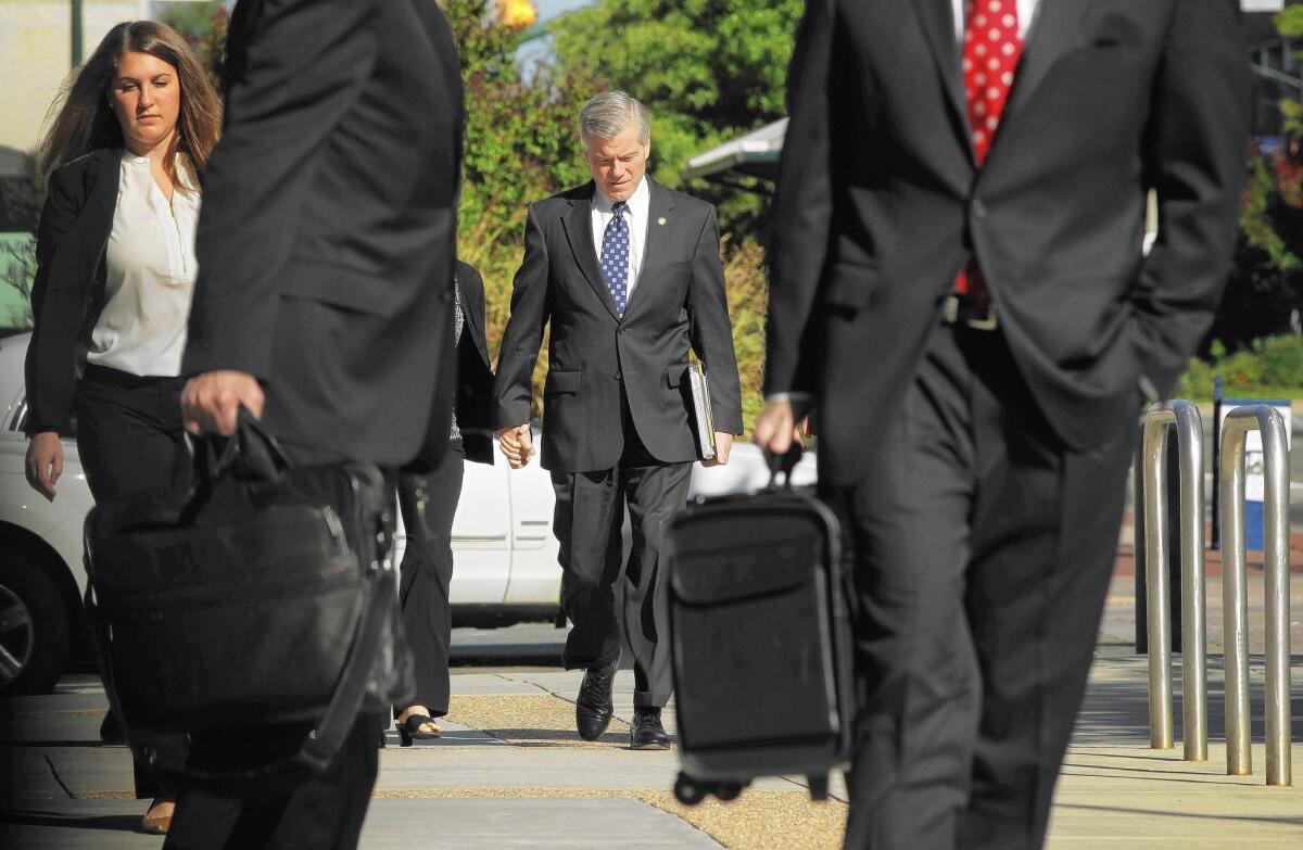 Former Virginia Gov. Bob McDonnell arrives Monday to face cross-examination in his trial on corruption charges. His wife, Maureen, also faces charges.