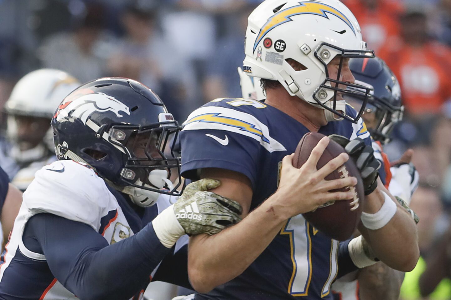 Denver Broncos linebacker Von Miller sacks Chargers quarterback Philip Rivers during second half action at Stubhub Center on Sunday.