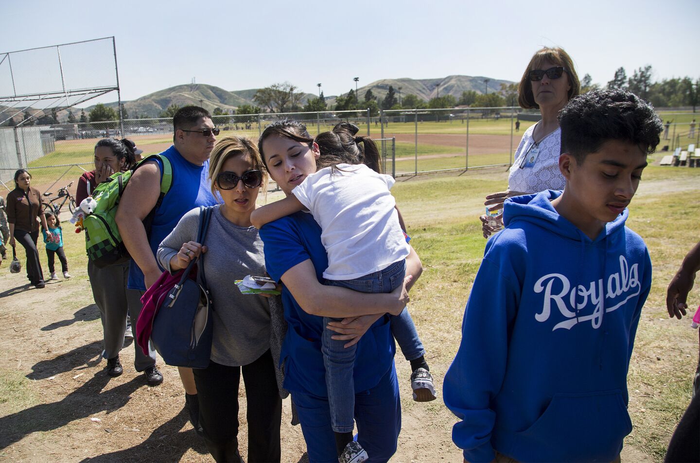 Parents are reunited with their children after a shooting inside North Park Elementary School in San Bernardino.