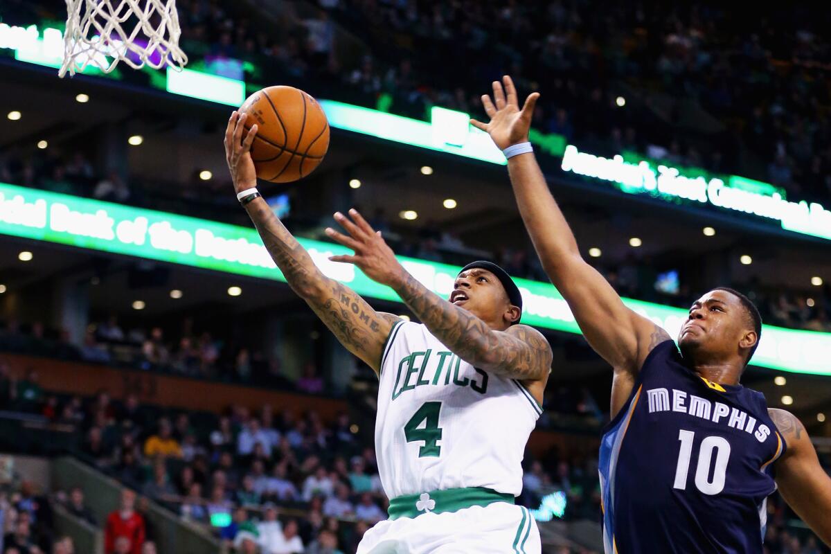 Celtics guard Isaiah Thomas (4) takes a shot against the Grizzlies' Jarell Martin (10) during the third quarter.