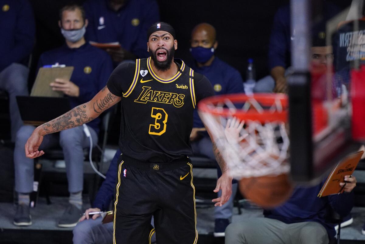 Anthony Davis reacts after making a three-point shot during Game 2 from nearly the same spot he'd later make the game-winner.