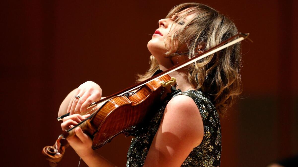 Violinist Lisa Batiashvili performs Tchaikovsky's Violin Concerto on Thursday at Walt Disney Concert Hall in Los Angeles.