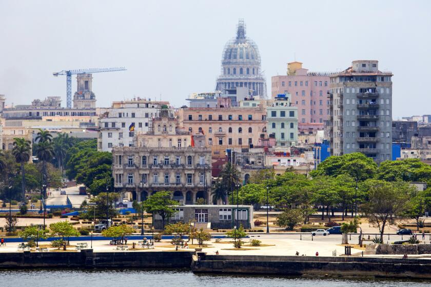 The dome of El Capitolio, the National Capitol Building, dominates the skyline in Havana, Cuba, on April 24, 2015.