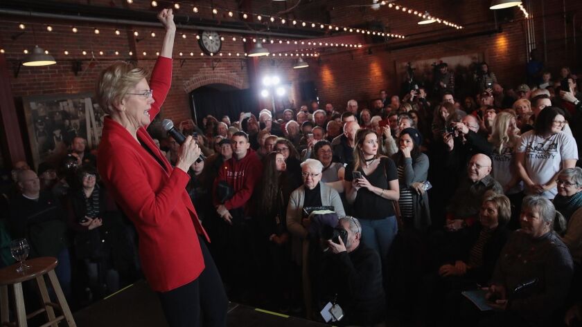 Massachusetts Sen. Elizabeth Warren, a Democratic presidential candidate, speaks at a March 1 campaign rally in Dubuque, Iowa. She unveiled her plan to break up tech giants Friday.
