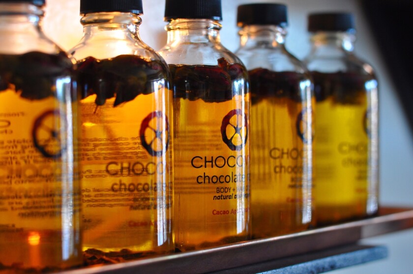 A row of ChocoVivo's new chocolate-rose oils.