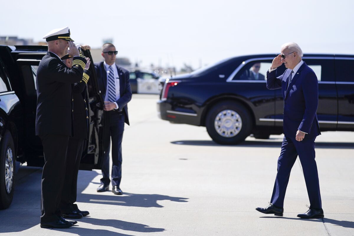 President Biden greets U.S. naval officials upon arrival in Coronado.