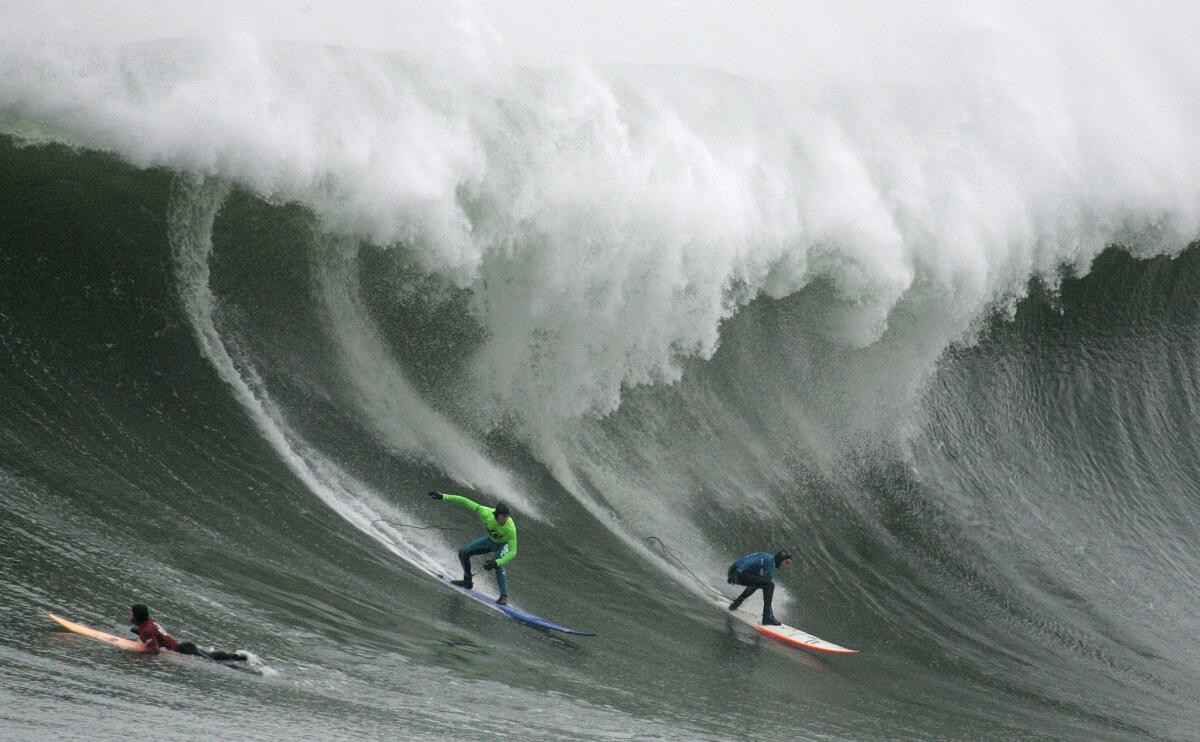 Participants in a Mavericks surfing contest near Half Moon Bay.