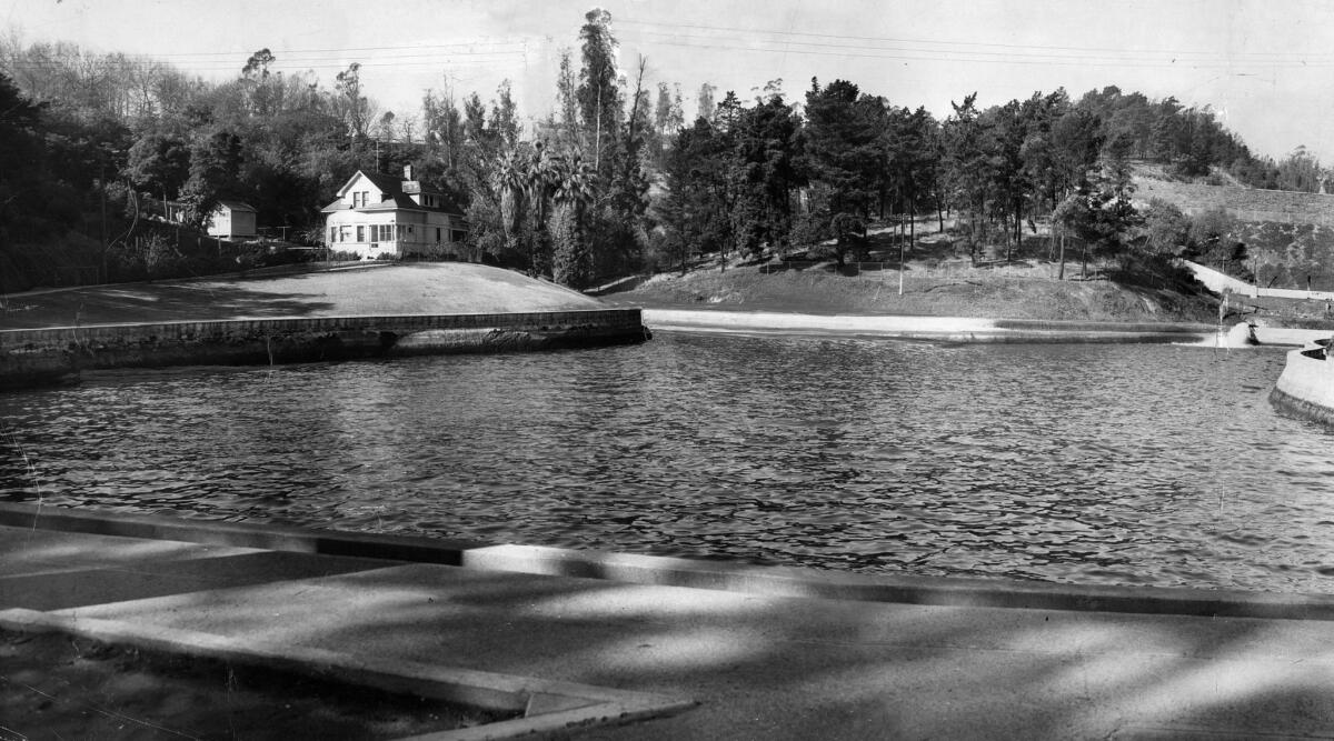 Dec. 22, 1949: View of caretaker's home at Buena Vista Reservoir in Elysian Park, alongside the Arroyo Seco Parkway. This panorama was made from two prints.