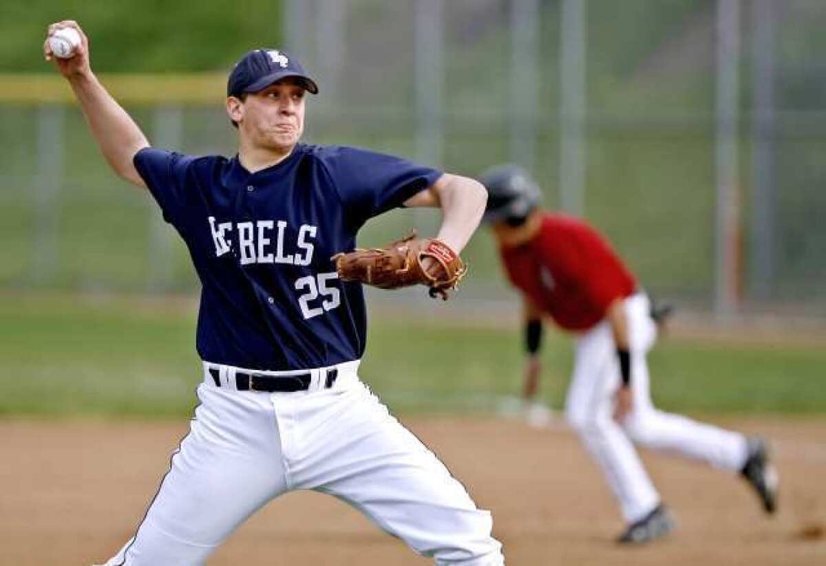 ARCHIVE PHOTO: Flintridge Prep High School pitcher Karlsen Termini throws during game vs. Santa Paula High School at home at the Glendale Sports Complex on Friday, March 5, 2010. (Raul Roa/News-Press)