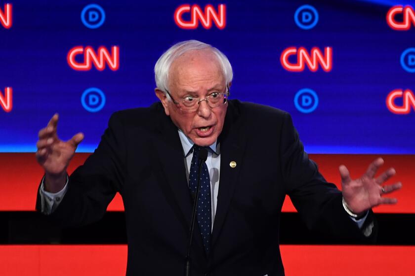 Democratic presidential hopeful US senator from Vermont Bernie Sanders gestures as he speaks during the first round of the second Democratic primary debate of the 2020 presidential campaign season hosted by CNN at the Fox Theatre in Detroit.
