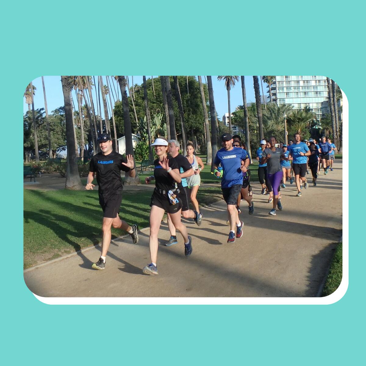 Group of runners jogging on a path.