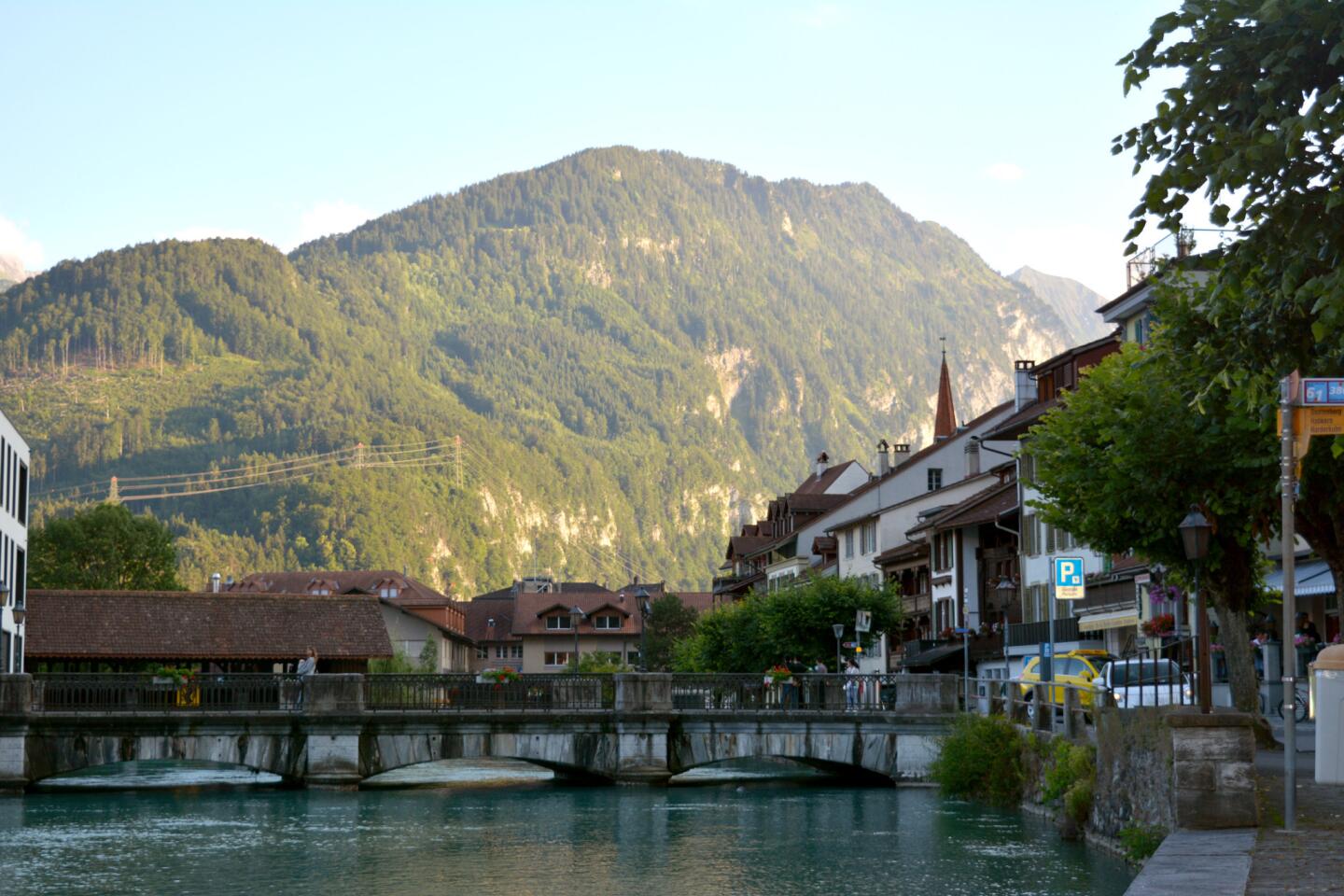Interlaken, a popular resort town, derives its name from its location between two lakes, Thun and Brienz.