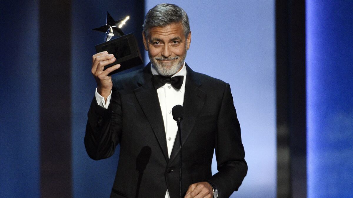 Actor-director George Clooney accepts the 46th AFI Life Achievement Award during a gala ceremony at the Dolby Theatre on Thursday.