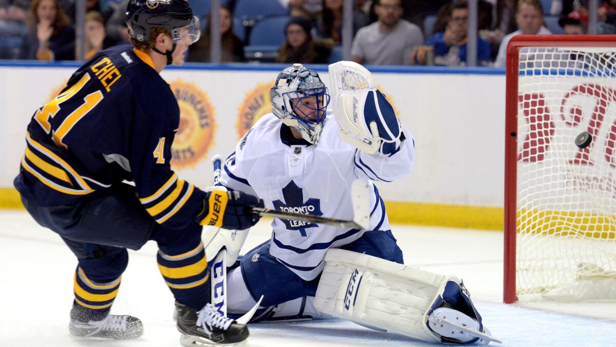 Rookie Jack Eichel (41), scoring against Maples Leafs goalie Jonathan Bernier on Sept. 29, gives the lowly Sabres some future firepower.