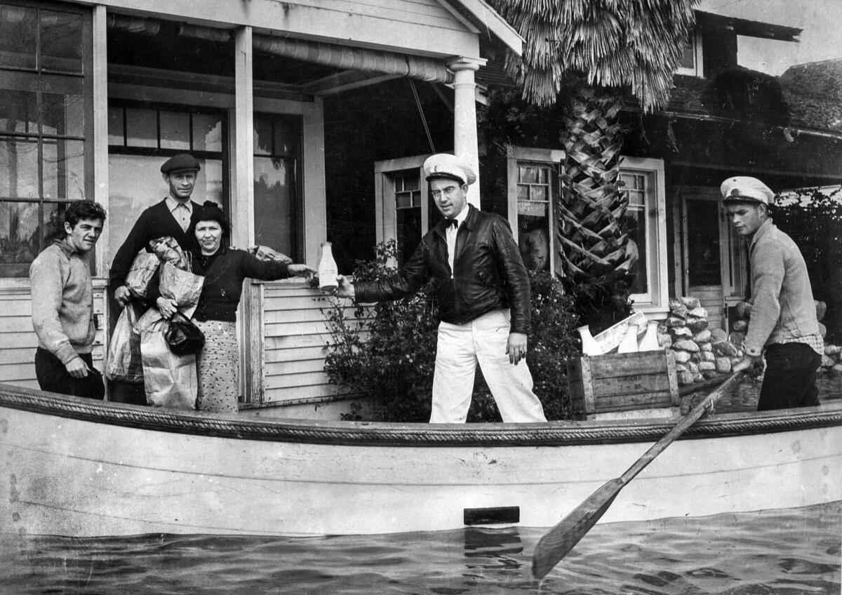 March 3, 1938: Milkman Ray J. Henville secured himself a boat and boatman and made all deliveries on time and on doorstep.