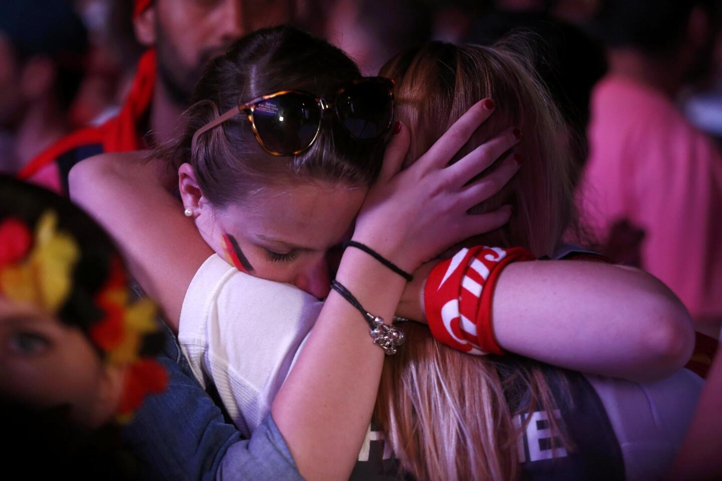 Fans of Germany react after the Euro 2016 match between France and Germany at a public screening in Berlin
