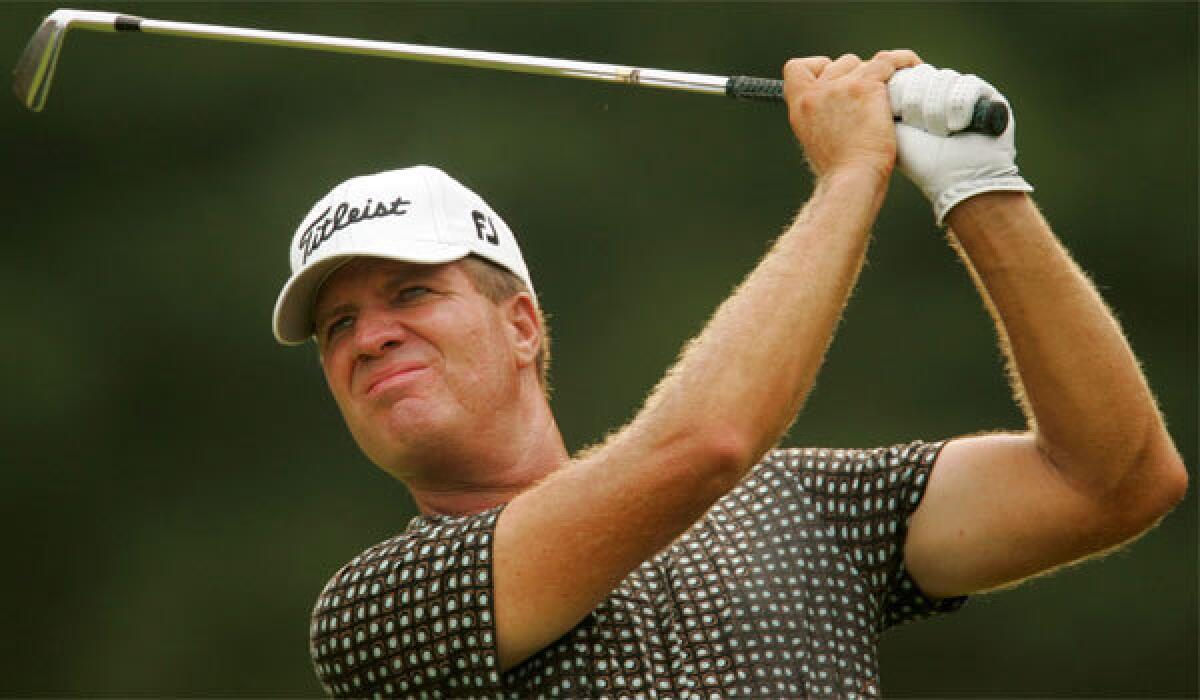 Steve Elkington tees off on the 12th hole during the final round of the 2005 PGA Championship.