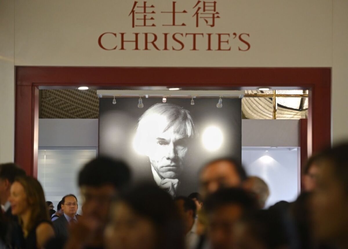 Guests gather at a preview of Christie's auction in Shanghai.
