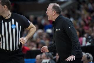 Long Beach State coach Dan Monson calls out to his players during the team's loss to Arizona