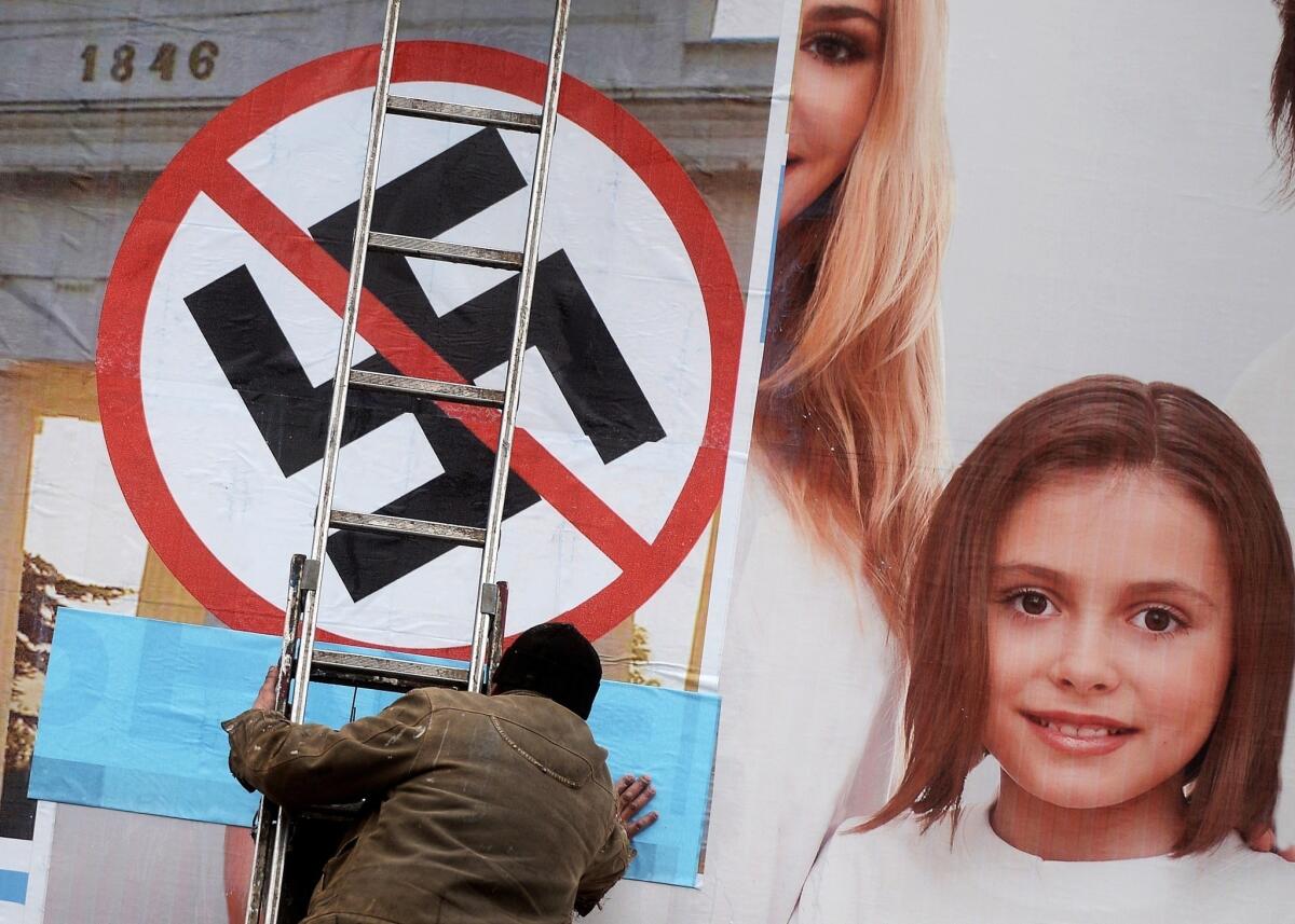 Right-wing extremists in Ukraine sport a symbol similar to the Nazi swastika shown above in Sevastopol.