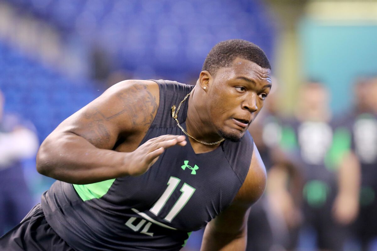 UCLA defensive lineman Kenny Clark performs a drill at the NFL scouting combine on Feb. 28.