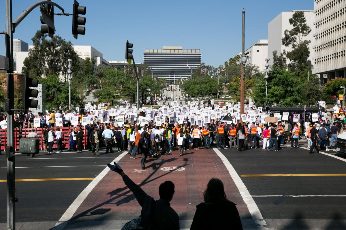 The L.A. City Council approved a wide-ranging salary agreement with with the Coalition of L.A. City Unions on Tuesday. Pictured above, the group protests in downtown Los Angeles in October 2014.