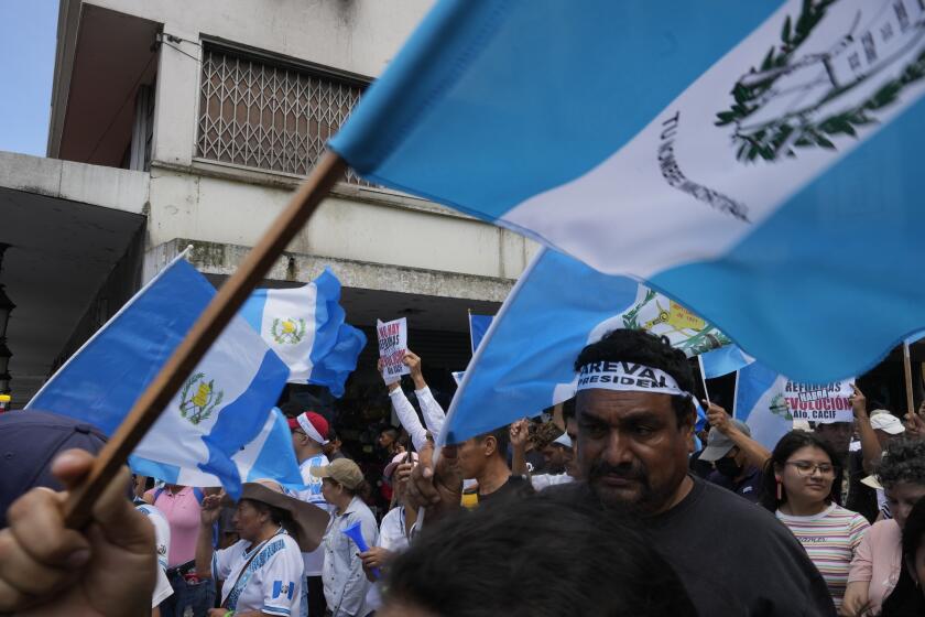 People march against legal actions taken by the Attorney General's office against the Seed Movement party and President-Elect Bernardo Arévalo, in Guatemala City, Saturday, Sept. 2, 2023. Guatemala's Congress has declared the Seed Movement's seven lawmakers — one of whom is Arévalo — independents, which bars them from holding leadership positions. (AP Photo/Moises Castillo)
