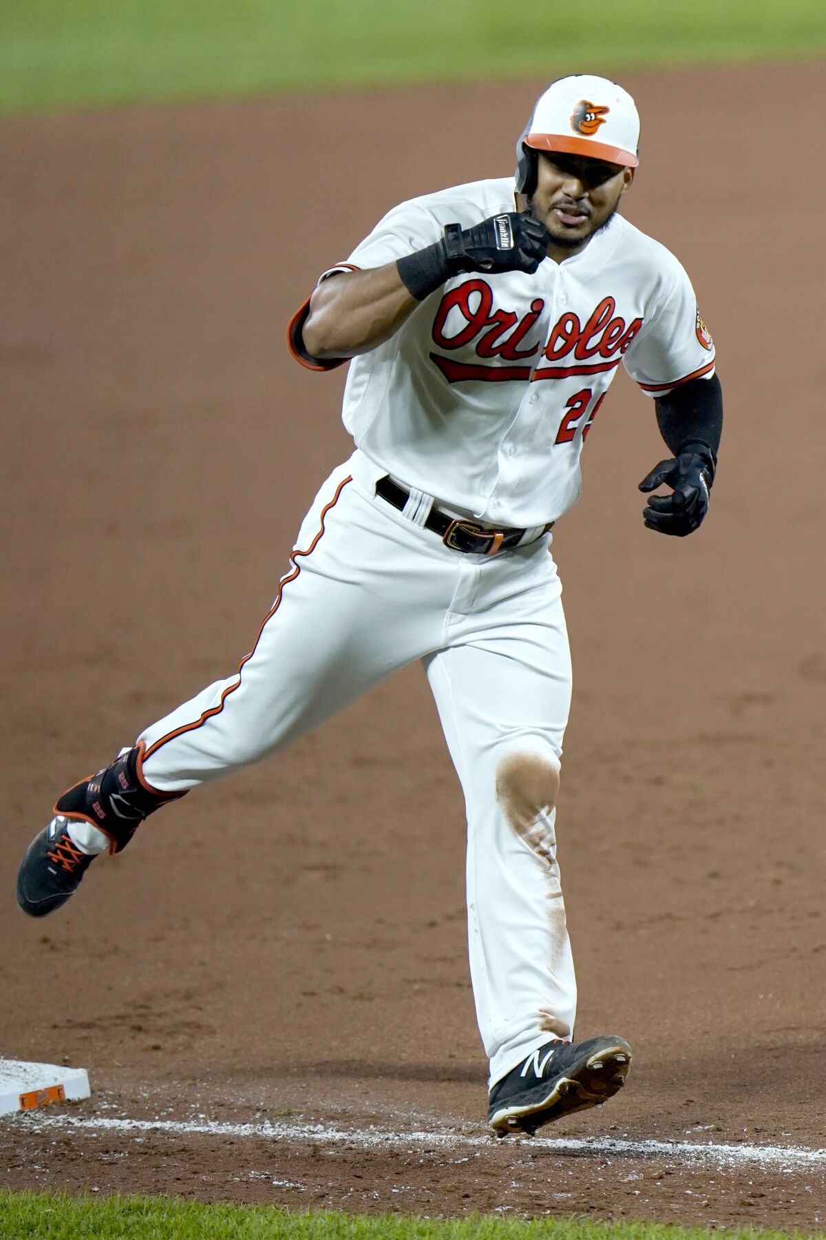 Baltimore Orioles' Anthony Santander reacts while running the bases after hitting a two-run home run off New York Mets relief pitcher Franklyn Kilome during the sixth inning of a baseball game, Tuesday, Sept. 1, 2020, in Baltimore. Orioles' Pat Valaika scored on the home run. (AP Photo/Julio Cortez)