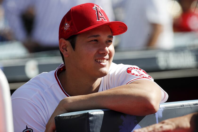 Los Angeles, CA - July 18: Los Angeles Angels' Shohei Ohtani watches.