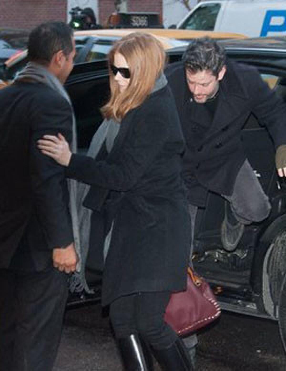 Amy Adams attends a service for actor Philip Seymour Hoffman at the Frank E. Campbell Funeral Chapel in New York.