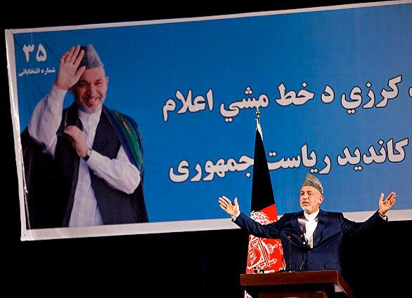 Afghanistan's President Hamid Karzai speaks in Kabul. Seeking a second term, he faces 40 candidates in an election to be held Aug. 20.
