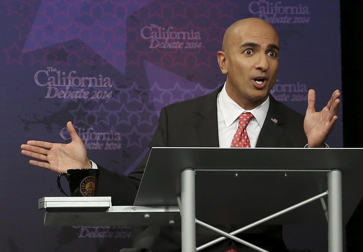 Republican challenger Neel Kashkari speaks during a gubernatorial debate with Gov. Jerry Brown.