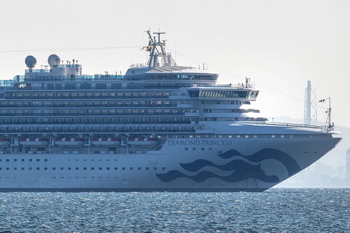 The Diamond Princess cruise ship with about 3,700 people on board sits anchored in quarantine off the port of Yokohama, Japan.