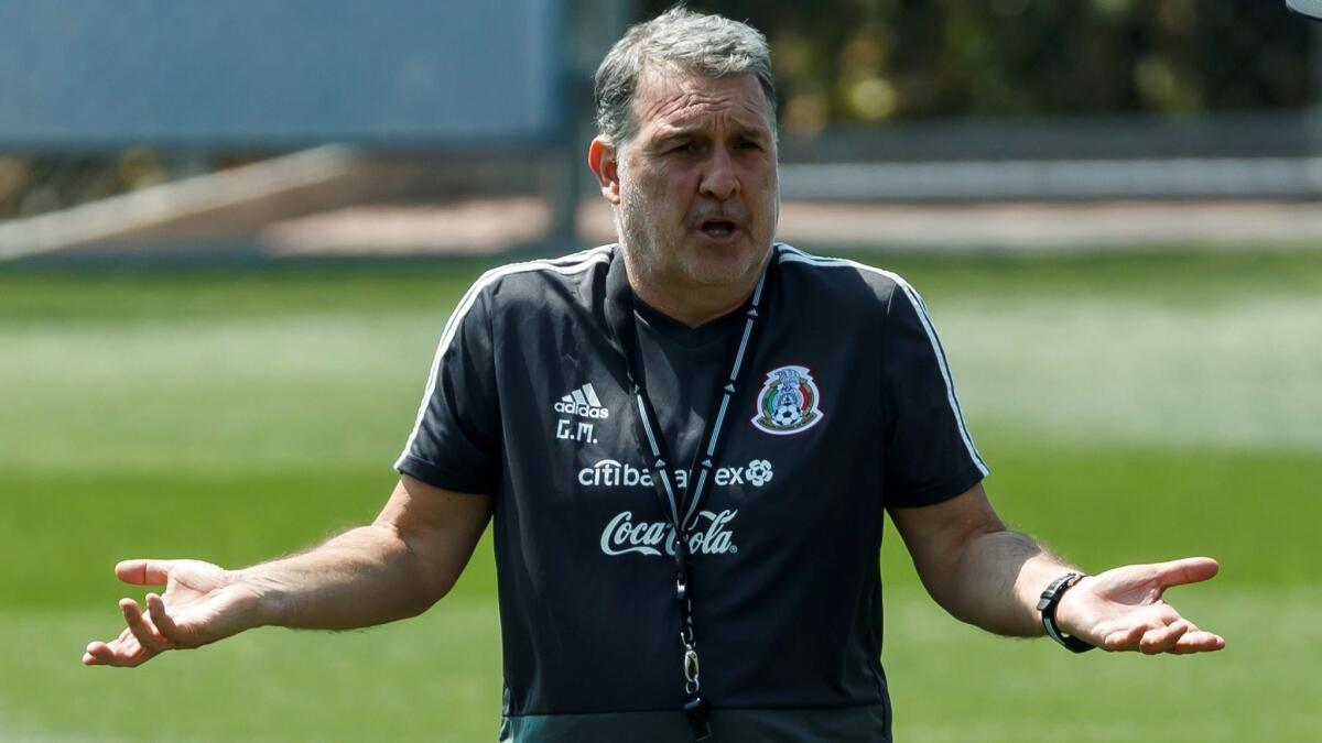 Mexico coach Tata Martino leads a training session May 21 in Mexico City. His team will compete in its CONCACAF Gold Cup opener Saturday against Cuba at the Rose Bowl.