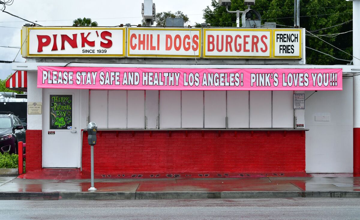 Los Angeles’ most famous hot dog stand, seen in early April, shut down voluntarily as of Monday.