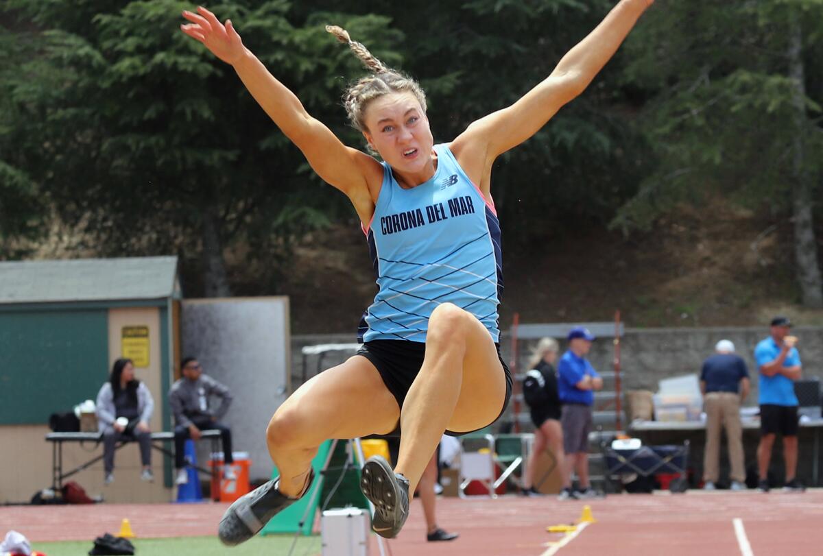 Corona del Mar's Caroline Glessing competes in the long jump during the CIF Southern Section Masters Meet on Saturday.