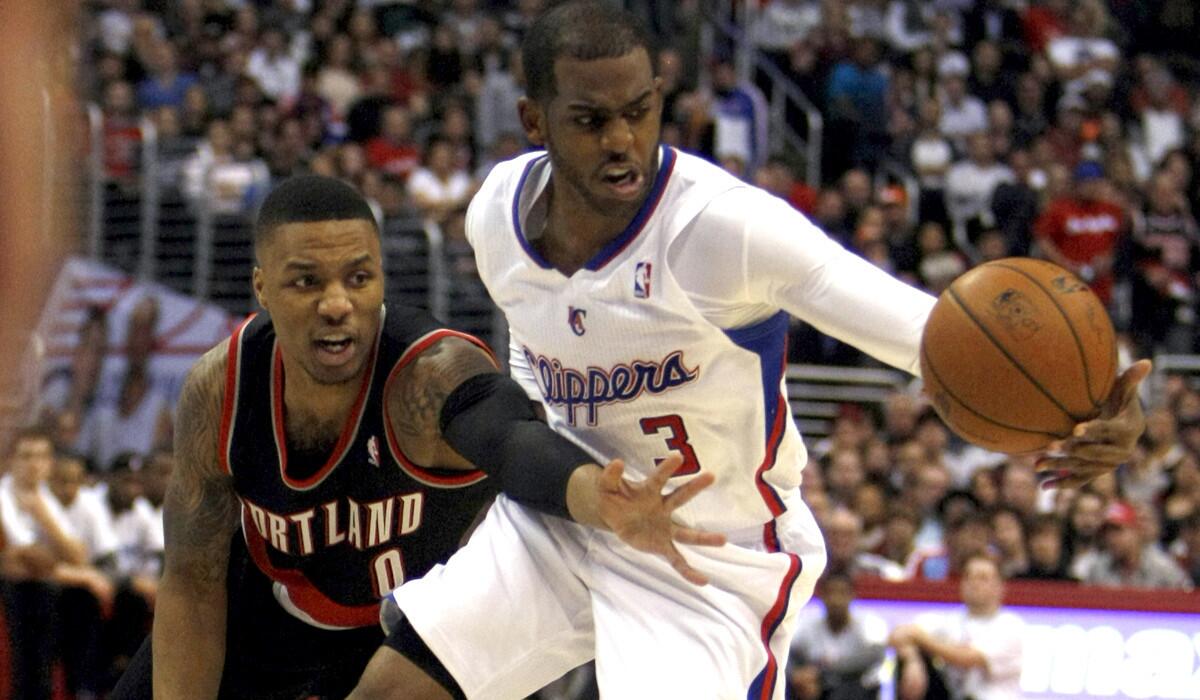 All-Star point guards Chris Paul (3) and Damian Lillard (0) will meet Friday night when Portland visits L.A. to play the Clippers.